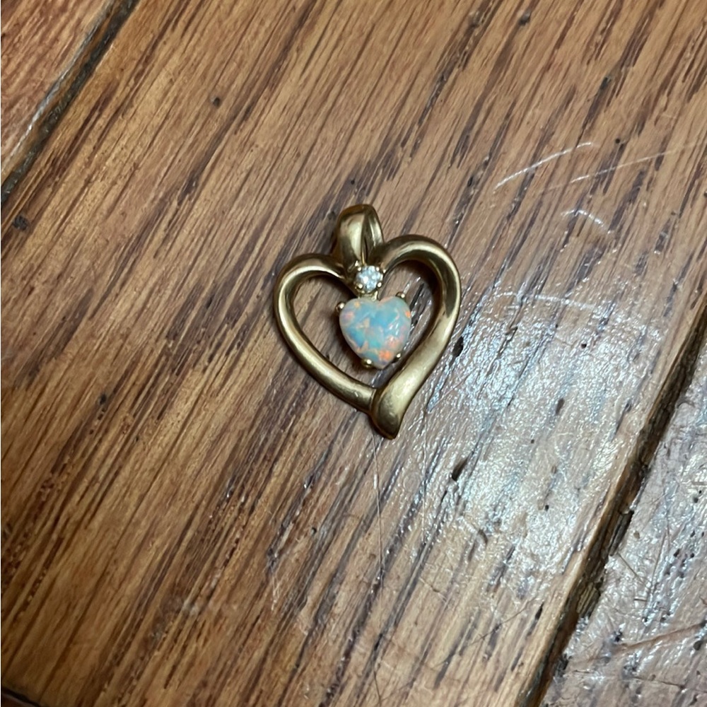 Gold heart opal pendant